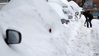 US north-east digs out of heavy snow - BBC News