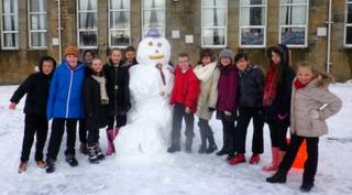 Kids with a snowman