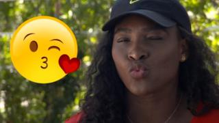 Serena Williams blowing a kiss.