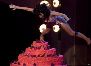 Katy Perry falling into cake