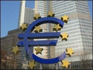 Euro currency logo sign in front of ECB building in Frankfurt