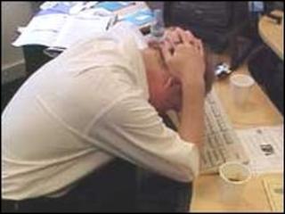 Image of a stressed worker