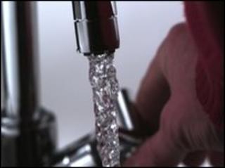 Water running from kitchen tap