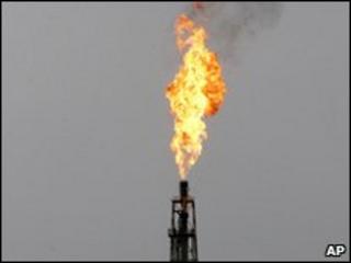Flame erupts from an oil refinery in Iran