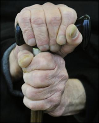 Hands of an elderly man