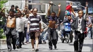 Anti-government protesters in Bangkok surrender to security forces