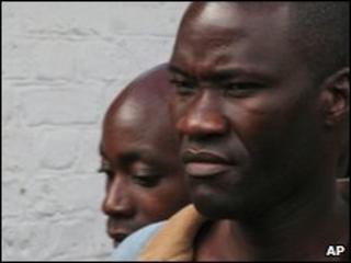 Tiwonge Chimbalanga, right, and Steven Monjeza are led from court in Blantyre on 20 May 2010