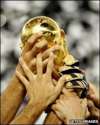 Players holding Fifa World Cup
