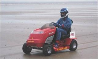 Don Wales testing the prototype lawnmower at Pendine sands
