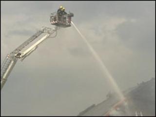 Firefighters tackle the blaze