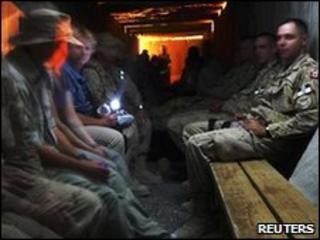 Isaf civilian and military staff in base shelter 22/05
