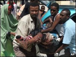 Wounded man being taken to hospital
