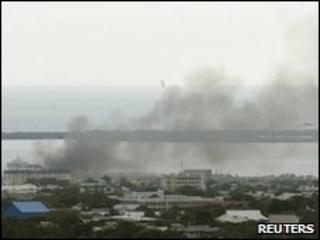 Smoke rises over Kingston's Tivoli Gardens community, 24 May