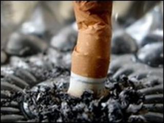 Cigarette stubbed out in ashtray