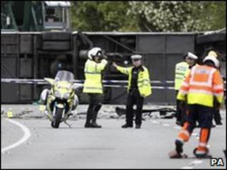 Emergency workers at the scene of the coach crash on the A66
