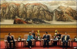 From left Treasury Secretary Timothy Geithner, US Secretary of State Hillary Clinton, Chinese President Hu Jintao and Vice Premier Wang Qishan at the Great Hall of the People in Beijing on 25 May 2010