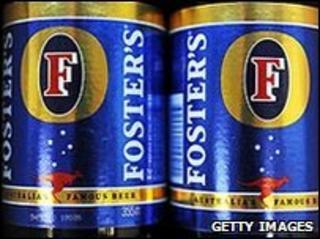 Cans of Foster's beer