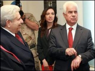 Cypriot President Demetris Christofias (left) with Turkish Cypriot leader Dervis Eroglu in Nicosia, 26 May 2010
