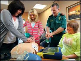 From left: responders Dianne Hawkins, Katie Gibby and Kristie Price receive training
