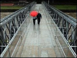 Workington residents crossing the new bridge