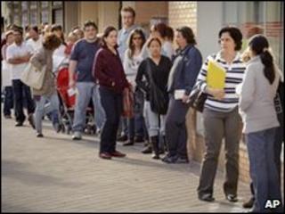 Unemployed line up in Spain