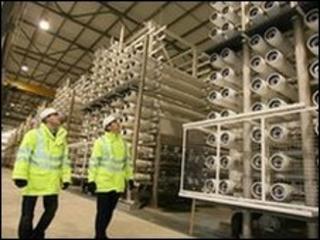 Two mean inside the desalination plant