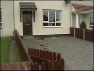 The armed men burst into the home shortly before midnight