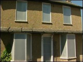 Boarded-up house