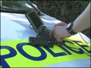 Officer using the Personal Digital Assistant