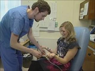 Nicky Legg with Mark Lyons, cardiologist