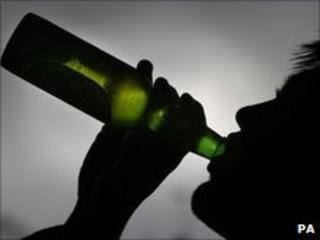 Man drinking from a bottle