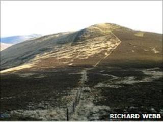 Cairn of Barns. Copyright Richard Webb and licensed for reuse under Creative Commons Licence