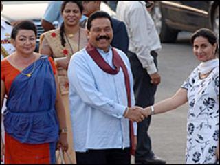 President Rajapaksa and his wife are greeted in Delhi by Praneet Kaur, Indian state minister of external affairs