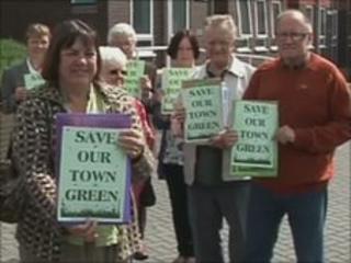 Protesters outside the court