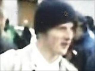 A man wanted for questioning over football violence