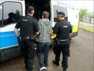 One of the men is arrested