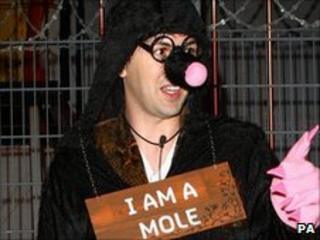 Mario dressed as a mole