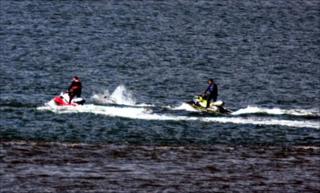 The men on sea scooters
