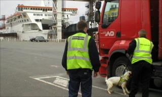 Sniffers dogs checking lorries at Calais
