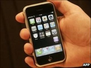 Hand holding iPhone