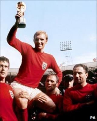 England captain Bobby Moore lifts World Cup trophy in 1966