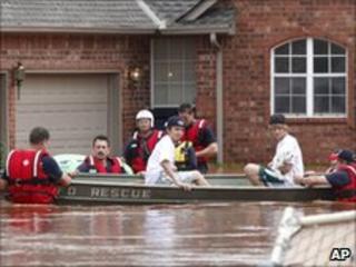 Authorities used boats to rescue stranded Oklahoma City residents