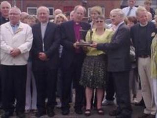 The leaders met the families at the memorial in Bogside