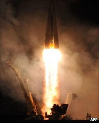 Soyuz lifts off (AFP)