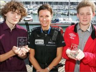 Connor Macey, Det Sgt Jackie Shaw and Harry Oswin at Brighton Marina
