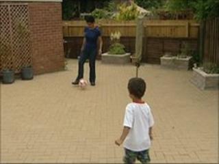 Andrea Jabangwe and her son