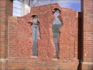 The carved brick sculpture was almost completed when it was attacked