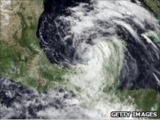 Handout satellite image of Tropical Storm Alex in the southwestern Gulf of Mexico as it closes in to land near the Mexico-Texas border on June 28, 2010, before it became a hurricane