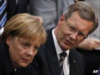 German Chancellor Angela Merkel, left, and Christian Wulff, presidential candidate, in the Reichstag on 30 June 2010