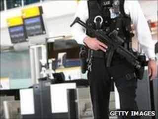 Armed officer at Heathrow airport